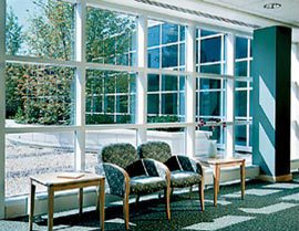 Waiting area seating by large windows